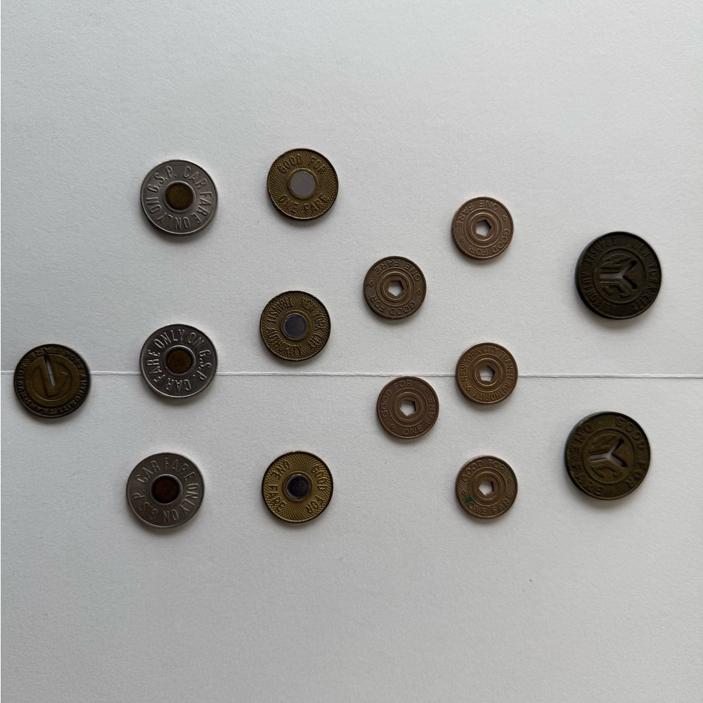 New York City subway tokens. Garden state toll tokens & Port Authority token